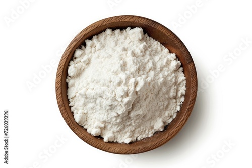 Top view of tapioca starch powder in wooden bowl on white background with clipping path