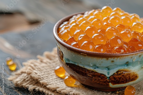 Bowl of bubble tea with honey and tapioca pearls photo