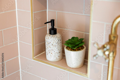 Ceramic Accessories Set in a Light Pink Tiled Shower Niche