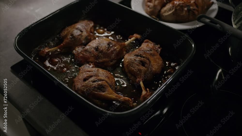 Sizzling roasted duck leg fresh out of the oven, healthy fat, oily food, delicious lunch, dinner, cooking at home, grilled fried meat, high calorie food, cooking, traditional European Christmas dish Sizzling roasted duck leg fresh out of the oven, healthy fat, oily food, delicious lunch, dinner, cooking at home, grilled fried meat, high calorie food, cooking, traditional European Christmas dish
