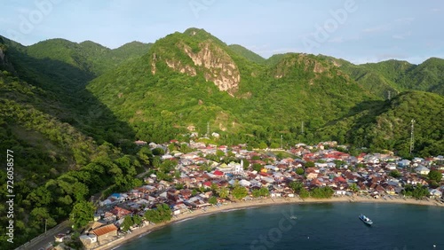 Gorontalo, Indonesia: Cinematic aerial drone footage of leato selatan village just outside Gorontalo by the Celebes sea in the Sulawesi island in Indonesia.  photo