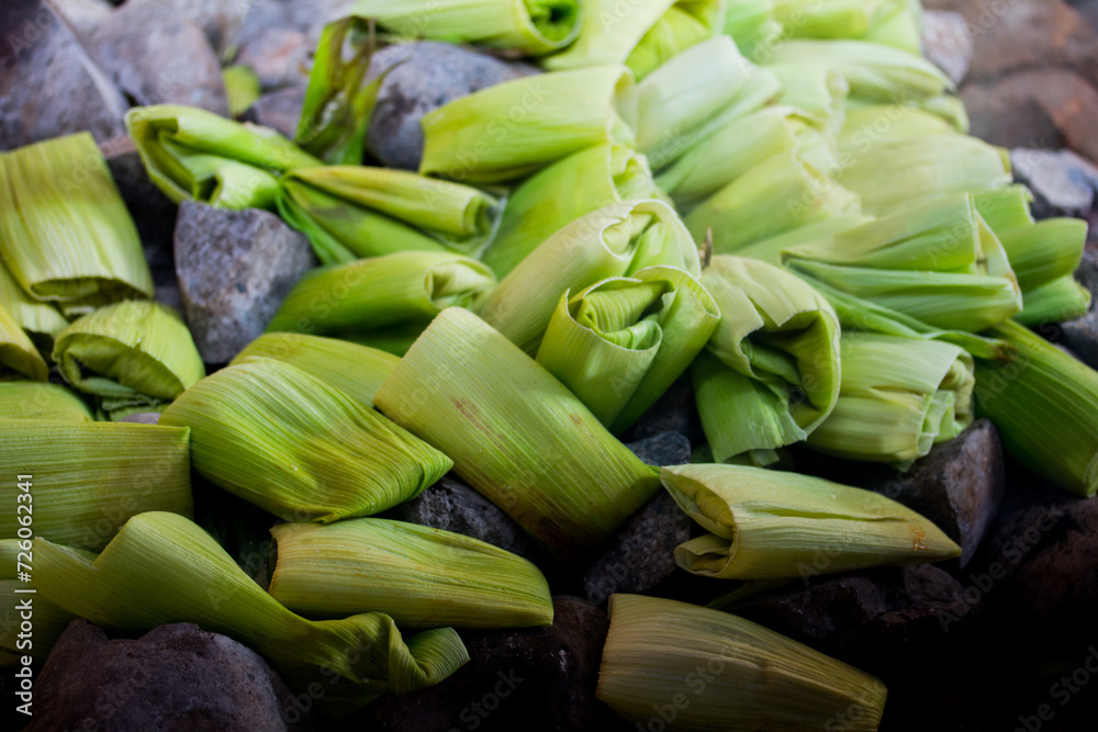 Photograph of preparation of the traditional Pachamanca in Peru. Typical dish from the Andes of Peru.