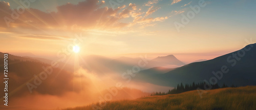 Breathtaking Sunrise Over Misty Mountains with Radiant Sunbeams and Lush Valleys © Alienmonster Images