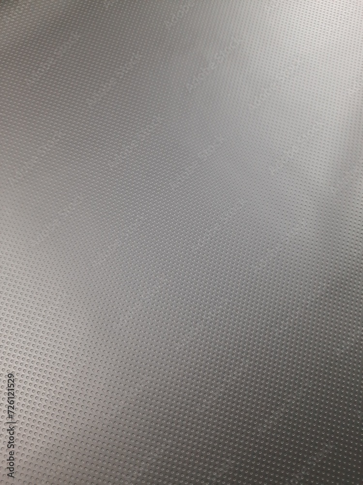 Faux leather with perforated texture Faux leather with perforated texture