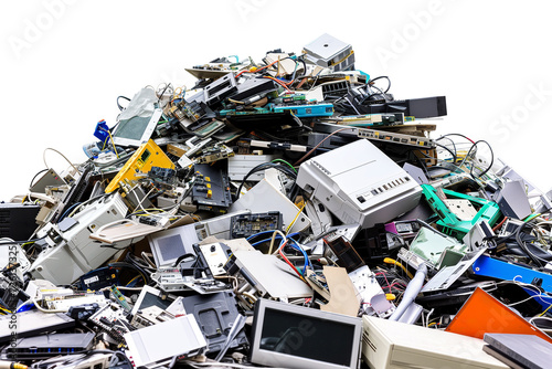 A large pile of assorted electronic waste highlighting the environmental issue of e-waste disposal and recycling