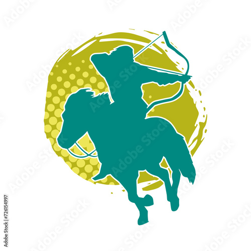 Silhouette of an ancient cavalry soldier aiming with archery weapon. Silhouette of an archer on his running horse.