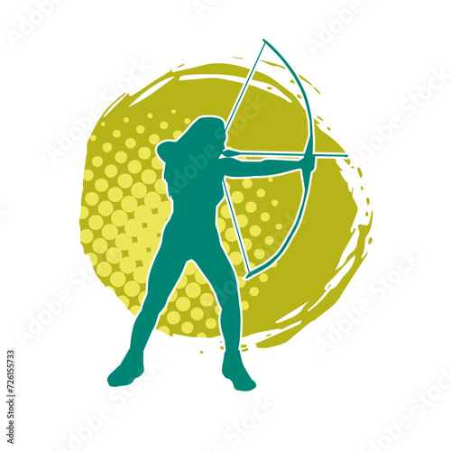 Silhouette of a female archer fighter in action pose with her arrow and bow.
