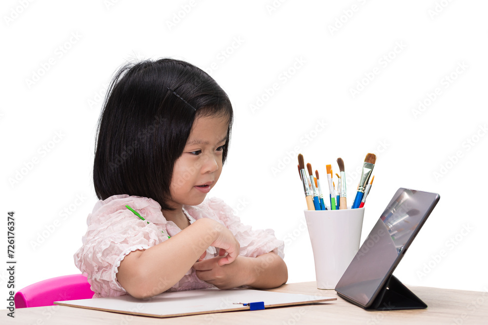 Asian Smiling preschool Child Girl happily engages in drawing and learning with colorful pencils and a laptop in a school setting, embodying the joy of childhood education and creative exploration. Asian Smiling preschool Child Girl happily engages in drawing and learning with colorful pencils and a laptop in a school setting, embodying the joy of childhood education and creative exploration.