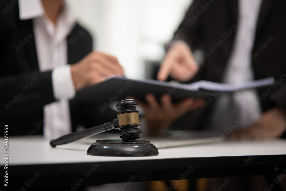 Judge gavel with Justice lawyers having team Concepts of Law and Legal services