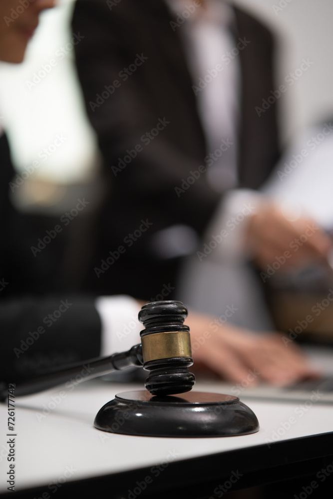 Judge gavel with Justice lawyers having team Concepts of Law and Legal services Judge gavel with Justice lawyers having team Concepts of Law and Legal services