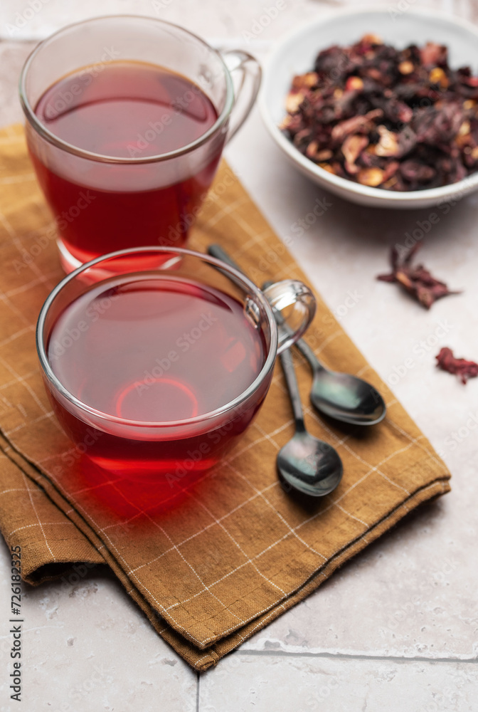 Glass cup of hot hibiscus tea. Glass cup of hot hibiscus tea.