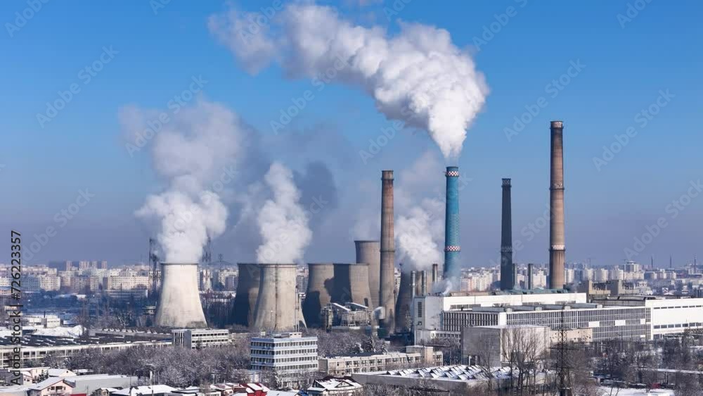 Aerial Sweep of a Coal Power Plant Belching Smoke into the Upper Atmosphere With a Sprawling Urban Landscape in the Distance, Romania Aerial Sweep of a Coal Power Plant Belching Smoke into the Upper Atmosphere With a Sprawling Urban Landscape in the Distance, Romania