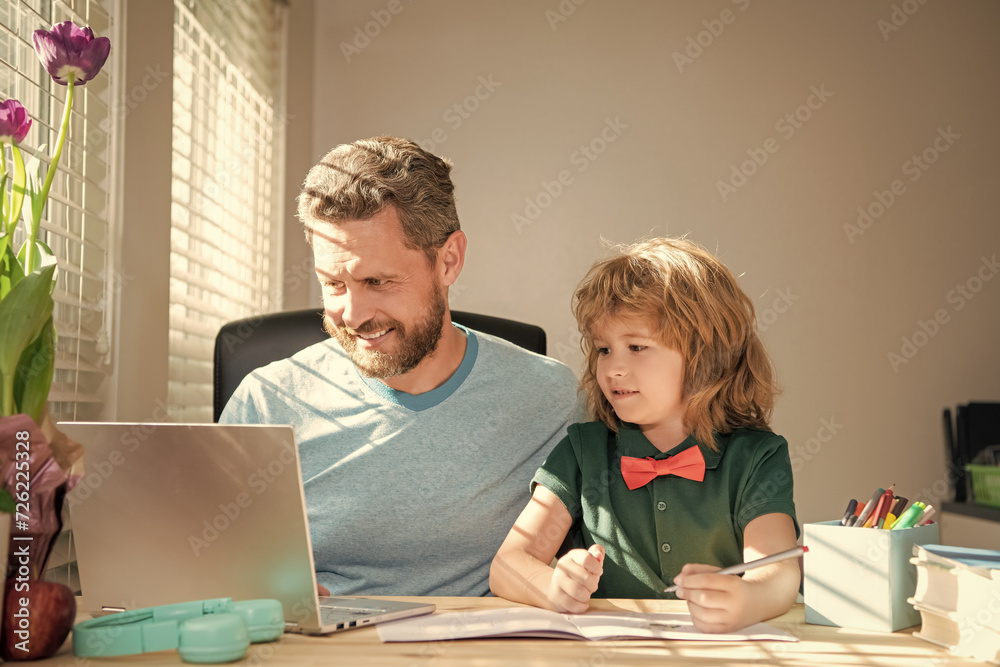 happy father and child son at school working online on laptop, family happy father and child son at school working online on laptop, family