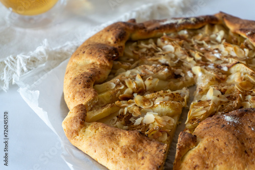 Apple galette with cinnamon and almond flakes