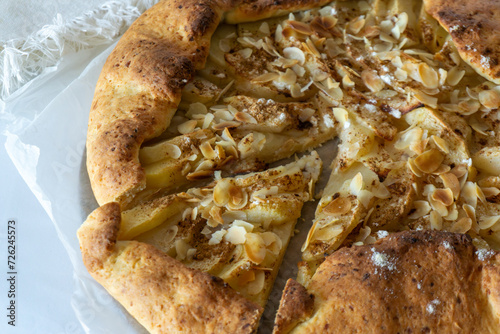Apple galette with cinnamon and almond flakes