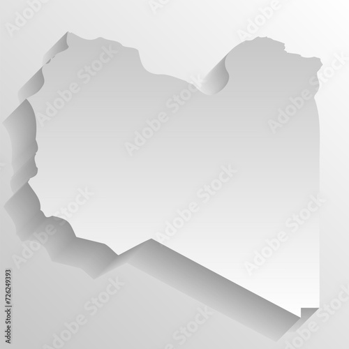 Libya country silhouette. High detailed map. White country silhouette with dropped long shadow on beige background. photo