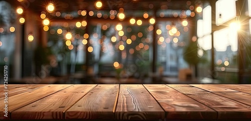 Vintage wooden table with blurred bokeh background in modern cafe or restaurant abstract perfect for displaying products with bright light retro design and empty space for business or celebration
