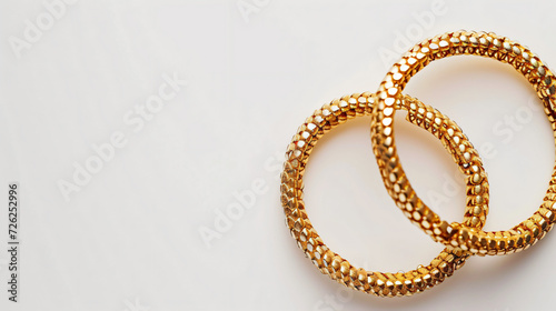Top view of two golden bracelets