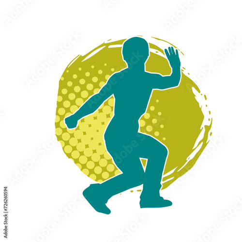 Silhouette of a man in oriental martial art pose. Silhouette of a male in martial art move.
