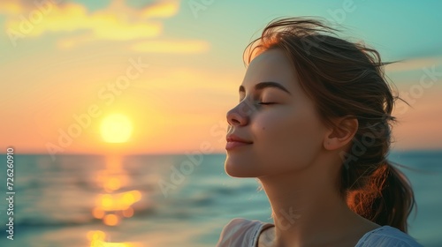 Sunset beach, woman with eyes closed, enjoying summer breeze