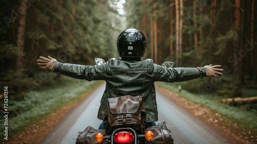 Motorcyclist on a trip on a forest road © Rimsha