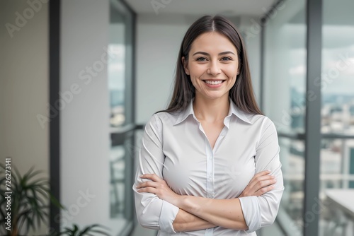 Confident Businesswoman Smiling, Successful, and Assertive Female Leader Poses with Crossed Hands