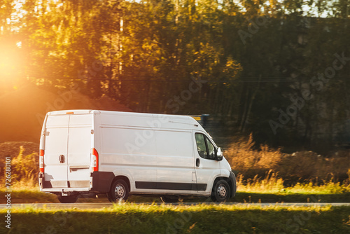 Wallpaper Mural A mockup of a white van with an empty wrap for you to customize. A commercial vehicle for your delivery and transport service. Isolated small white truck on the road. Torontodigital.ca