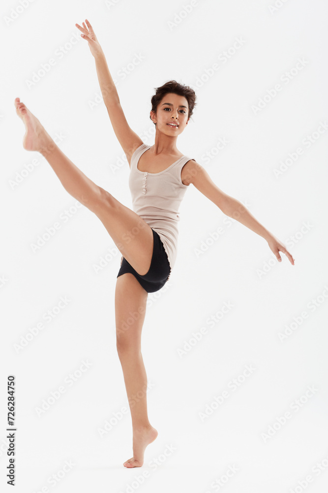 Dance, ballet and portrait of girl in studio for performance, fitness and training for theatre. Ballerina, young dancer and isolated person for balance, routine and practice on white background Dance, ballet and portrait of girl in studio for performance, fitness and training for theatre. Ballerina, young dancer and isolated person for balance, routine and practice on white background