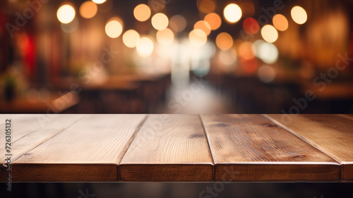 Empty wooden table with blur restaurant background