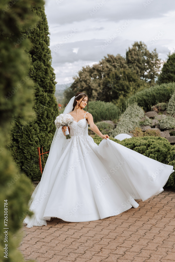 Beautiful bride with wedding flowers bouquet, attractive woman in wedding dress. Happy newlywed woman. Bride with wedding makeup and hairstyle. Smiling bride. Wedding day. Gorgeous bride. Marriage. Beautiful bride with wedding flowers bouquet, attractive woman in wedding dress. Happy newlywed woman. Bride with wedding makeup and hairstyle. Smiling bride. Wedding day. Gorgeous bride. Marriage.