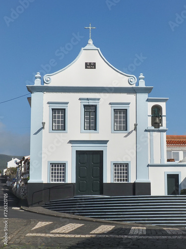 Old church 'Igreja do Desterro', white plastered walls with light blue details. Angra do Heroísmo, Terceira, Azores, Portugal. Portuguese Religious Architecture.