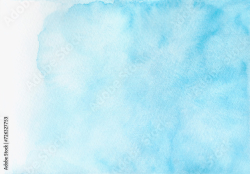 Watercolor abstract background in blue shades with blurring, hand-drawn. The texture of watercolor on paper. A banner with a place for text for design and decoration. Illustration of the sky. 