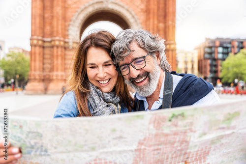 Canvas Print Married couple visiting Triumphal Arch in Barcelona, Catalonia, Spain - Two seni