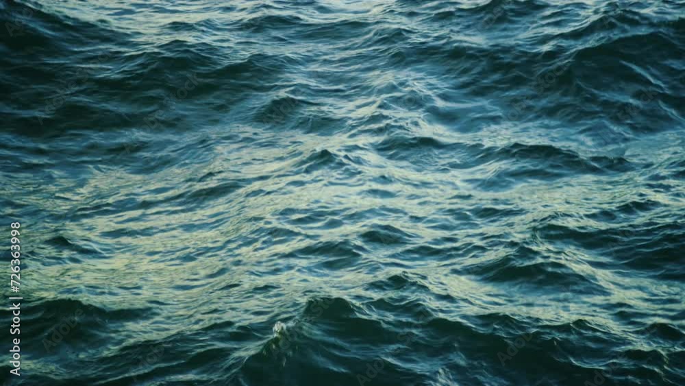 Ocean waves crash at sea