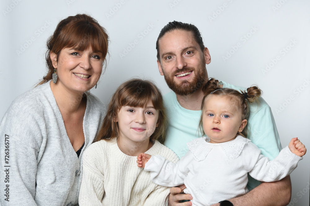 group of parents and children on white background