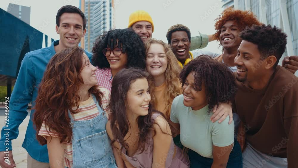 Multiethnic group of teenagers hanging out in the city center. Concepts about campus university students, friendship, and generation z Multiethnic group of teenagers hanging out in the city center. Concepts about campus university students, friendship, and generation z