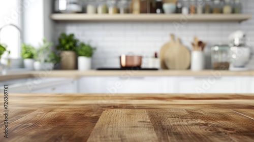 Wood table top on blur kitchen counter (room)background.
