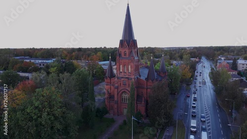 Aerial images froma a Medieval Church in Estonia in the midle of a village photo