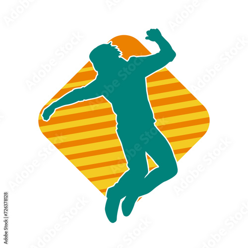 Silhouette of a slim man dancing pose. Silhouette of a male dancer in action pose.