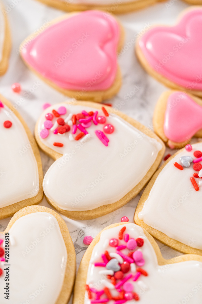 Heart-shaped sugar cookies with royal icing Heart-shaped sugar cookies with royal icing