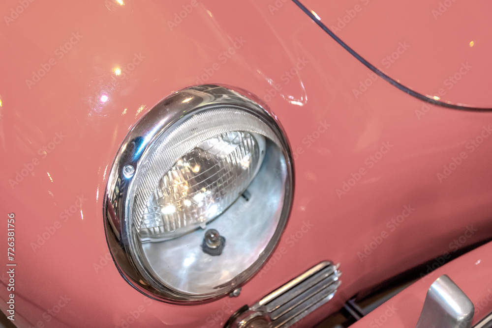 retro car headlight close up