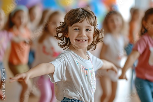 Happy children in stylish clothes dancing in choreography class