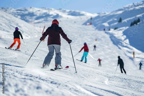 People skiing on winter vacation on ski slope