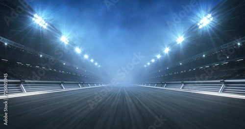Empty racing track and shining spotlights on sport stadium. Professional 4K video loop for racing sports advertisement.