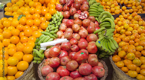 choosing fruit at the grocery store