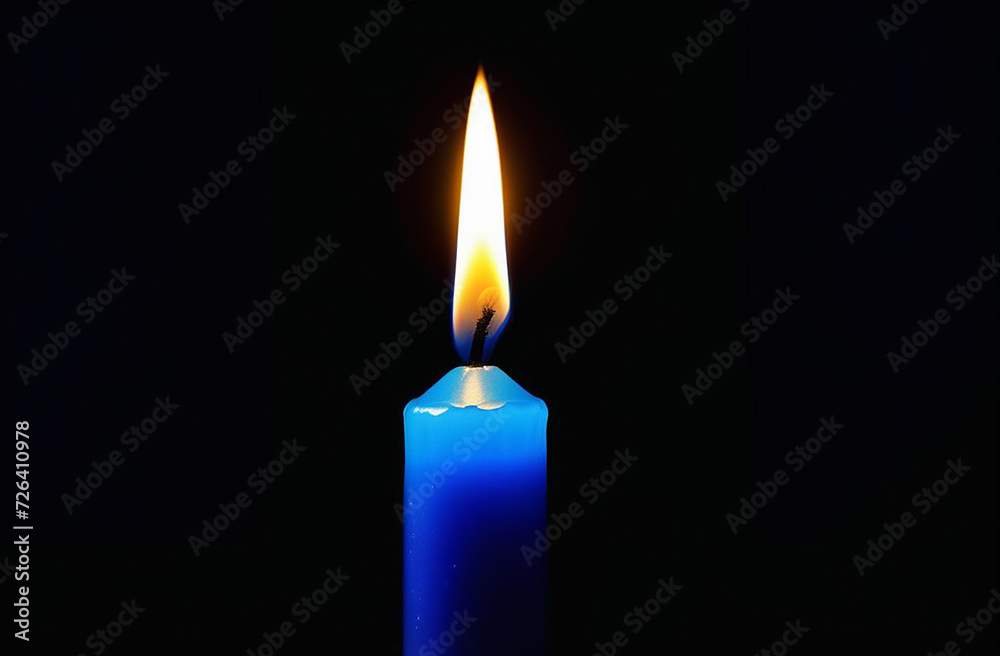 Blue candle on a black background. Blue candle on a black background.