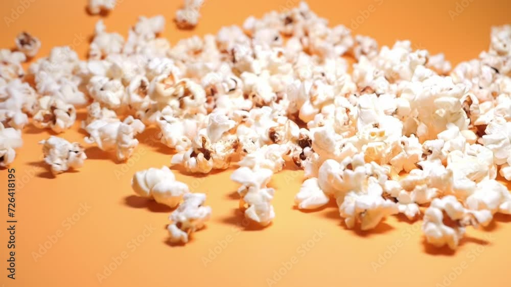 Sweet butter popcorn, close up,slow motion Sweet butter popcorn, close up,slow motion
