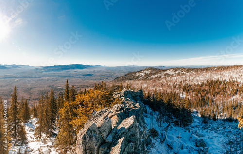 View on amazing winter landscape in mountain coniferous forest.