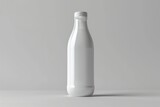 A bottle of milk placed on a clean white surface. Perfect for showcasing dairy products or a healthy lifestyle