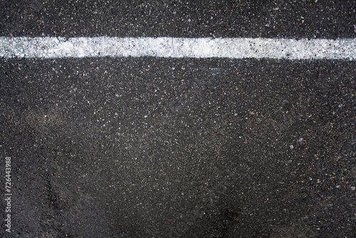 Warning markings, restrictive white stripe in the parking lot. An image for your design or creative illustrations about service and protection. photo